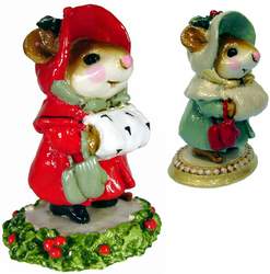 Lady mouse in overcoat and matching hat with hand ia a muff