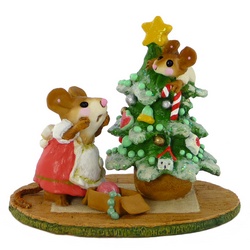 Mother mouse shocked to find her child up a Christmas tree