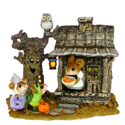 Spooky house and animated tree with owl lady mouse hold out candy for two trick or treaters