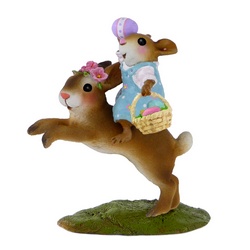 Young girl mouse ridding a bunny and carring an Easter basket
