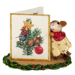 Female mouse looks at her huge Chrismtas Card.