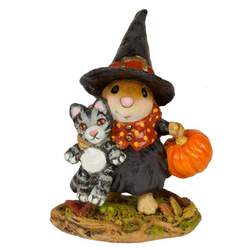 A little witch has a mission to accomplish with her little pumpkin. Good thing she has her kitty in tow! 
