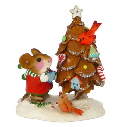 Little mouse decorating a pine cone tree with two bid helpers