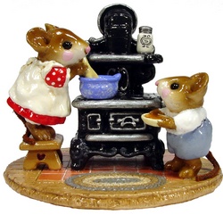 Lady mouse standing on a stool stirring a pot and child waiting with a bowl