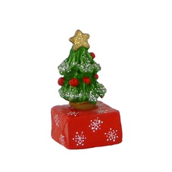 Small Christmas tree on a wrapped package