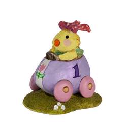 Easter chick in peddle car