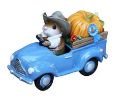 Proud mouse on the way home with his first prize pumpkin in his blue pickup