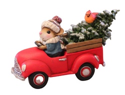 Father mouse in his pickup with a Christmas tree