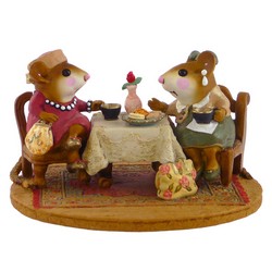 Two mice having afternoon tea in style