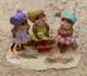 three adorable beach mice enjoying a carefree day by the shore