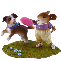 Girl mouse throughs a fisby for her dog