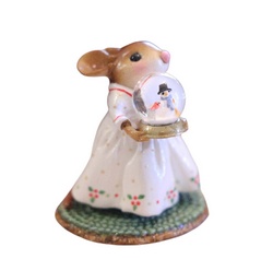 Female mouse in pretty white dress holding a snow globe