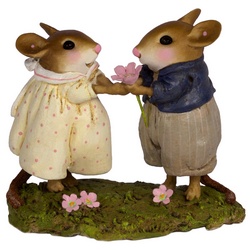 Boy mouse offers flower to girl mouse