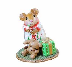 Mouse with every ready for Christmas, candy cane, stuffed aminal and wrapped present