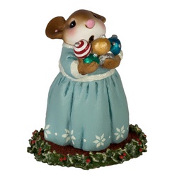 Female mouse carring an armful of treee ornaments