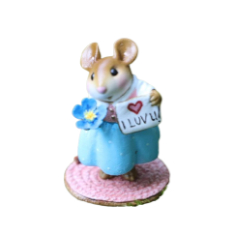 Mother mouse holding flower and sign