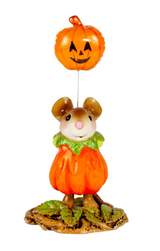 Young mouse in pumpkin costume holding a puomking balloon.