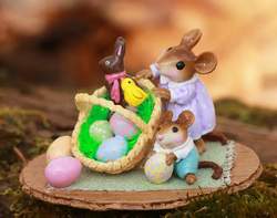 Mother Mouse  jumps in to make sure all carefully decorated chocolate eggs are safe! 
