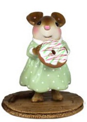 Girl mouse holding donut green and red glazed