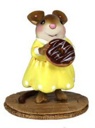 Girl mouse in yellow dress with chocolate donut