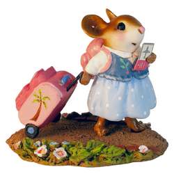 A little traveler is off on her next adventure! From the looks of it she's going somewhere warm and her sweet pink cheeks are beaming with excitement