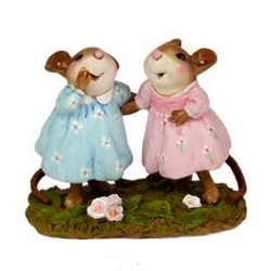 Smiles on the faces of two mouse, girl friends brought by a secret only those two understand! 