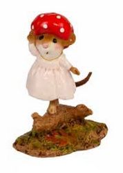 A cap made of a perfect red mushroom and a soft pink dress with tiny white polka dots keeps this mousey cozy as she balances on a woodland log without a care in the world.