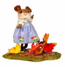 This wee mouse shuffles her toes through the newly fallen and crisp colors of fall 