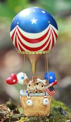Two mice in a hot air balloon basket they carry the key components to celebrate our Independence Day!