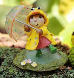 A rainy day can't bring the blues when you have rain boots to jump in puddles, a duck rain coat and your very own umbrella! This piece embodies the joy seen on a kid who makes some fun out of a rainy day! 