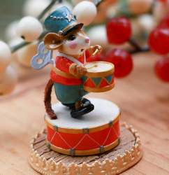 This little wind up toy drummer taps away to the beat of these twelve precious gifts 